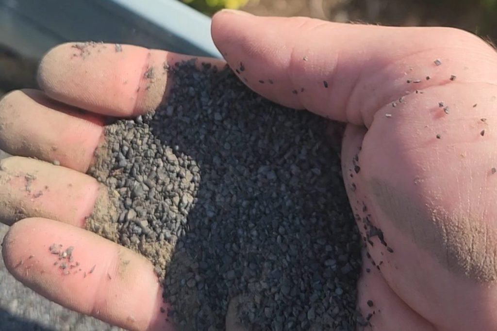 roof needing to be replaced because of granules in its gutters