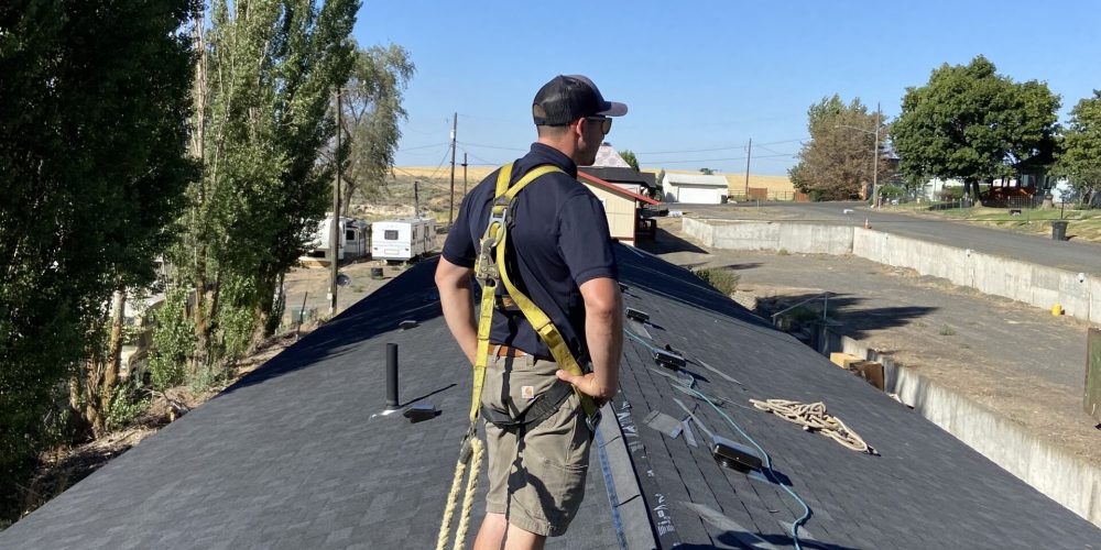 RC Roofing crew prepping the job site for a roof repair